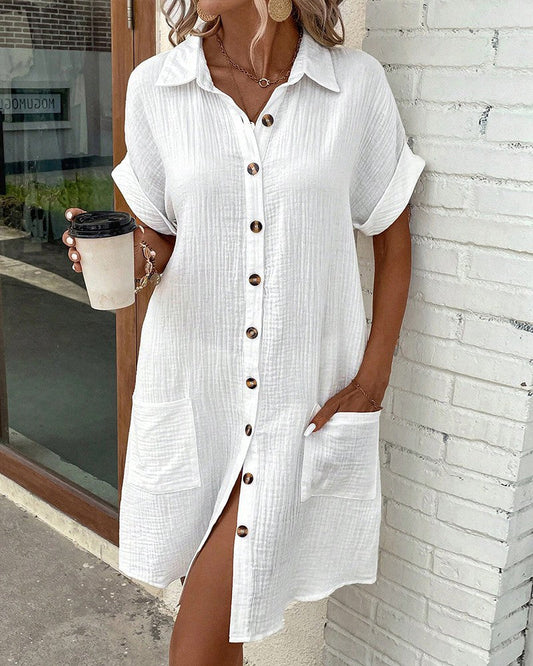 Robe chemise unie à manches courtes avec poches boutonnées