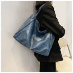 Schulterhandtasche aus trendigem Leder