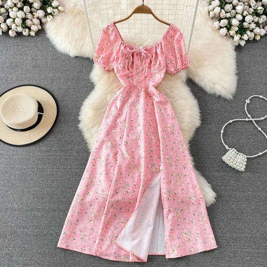 Robe d'été vintage ModeParisienne® avec manches boules à imprimé floral et taille fine