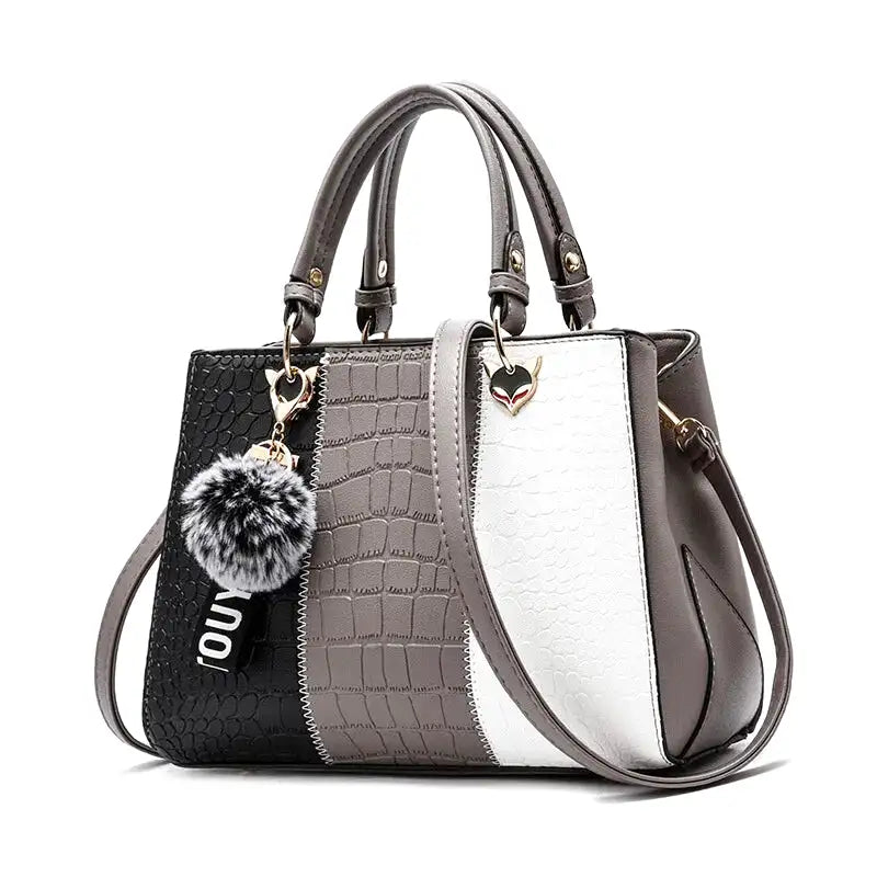 Schulterhandtasche aus Krokodilleder