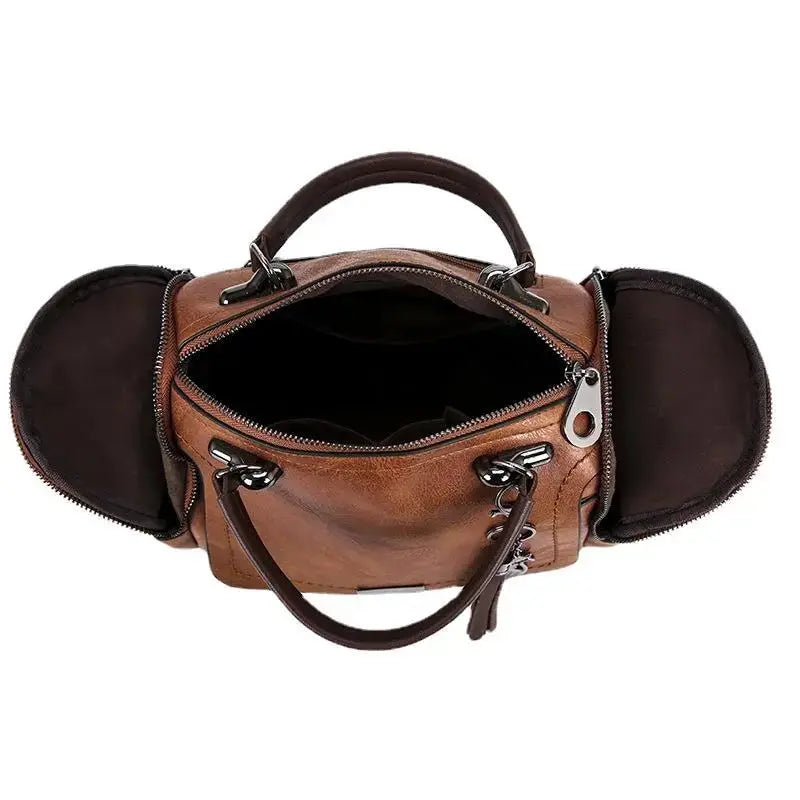 Geräumige Handtasche aus weichem Leder mit Tragriemen und Reißverschlussverschluss