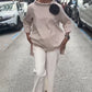 Elegante blouse met een onregelmatige snit en lange mouwen
