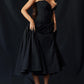 Puk | Elegante Zwarte strapless midi jurk