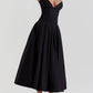 Puk | Elegante Zwarte strapless midi jurk