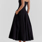 Puk | Elegante Zwarte strapless midi jurk