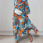 Jurk met vlotte print en V-hals