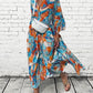 Jurk met vlotte print en V-hals
