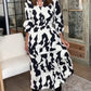 Maxi-jurk met lange mouwen en een print