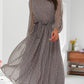 Elegante jurk met stippen