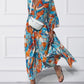Jurk met vlotte print en V-hals