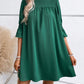 Elegante jurk met col in een effen kleur