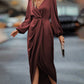 Elegante jurk met lantaarnmouwen en v-hals