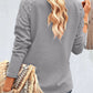 Elegante blouse met een spitsvormige kanten halslijn