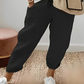 Pantalon uni avec cordon de serrage et poche oblique