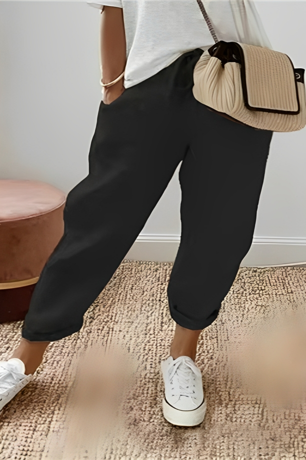 Pantalon uni avec cordon de serrage et poche oblique