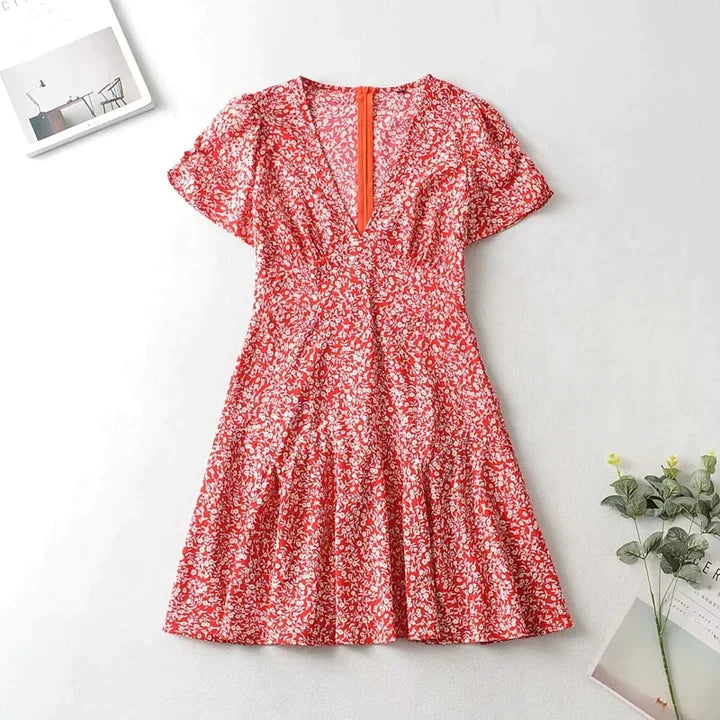 Kiersten | DAMES JURK MET BLAUWE BLOEMENPRINT VOOR DE ZOMER EN HET STRAND