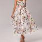Robe asymétrique à cravate imprimée
