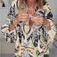 V-hals herfstblouse met kleurtjes