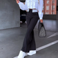 Costume deux pièces avec pantalon et haut à manches longues avec revers