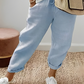 Pantalon uni avec cordon de serrage et poche oblique