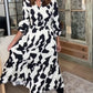 Maxi-jurk met lange mouwen en een print