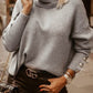 Elegante trendy trui met hoge kraag